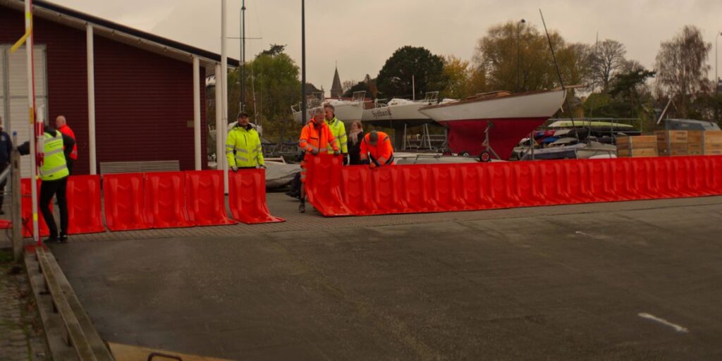 Deploying the EasyWall water diversion barriers for flooding